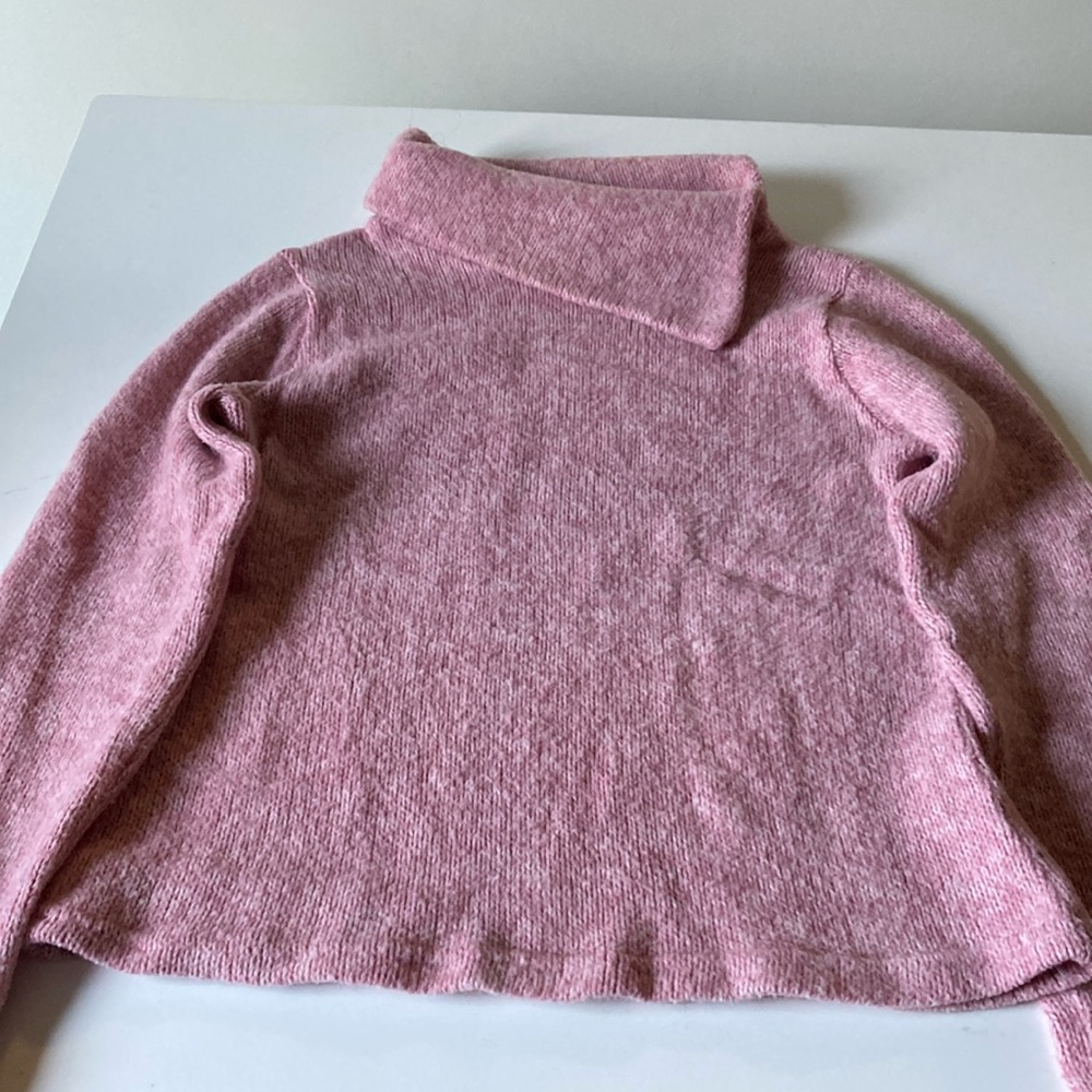 Pink turtleneck sweater
